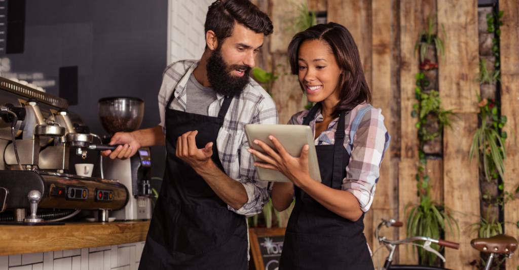 male and female restaurant server taking order on tablet like API works 1024x533 1